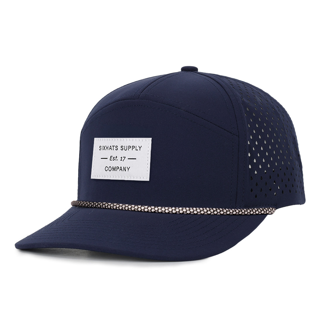 Navy tradesman blue baseball cap waterproof sweat proof with a white fabric side view